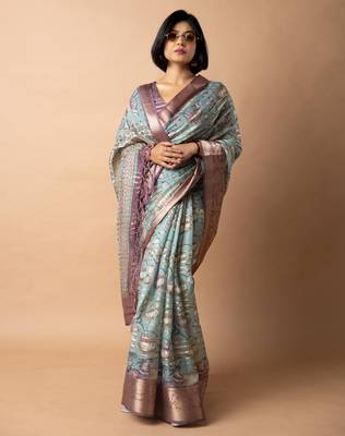 teal floral print zari woven border crepe saree with unstiched blouse piece 2