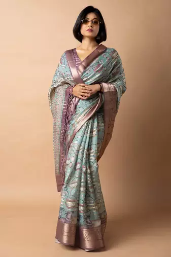 teal floral print zari woven border crepe saree with unstiched blouse piece