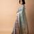 teal floral print zari woven border crepe saree with unstiched blouse piece