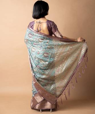 teal floral print zari woven border crepe saree with unstiched blouse piece 4