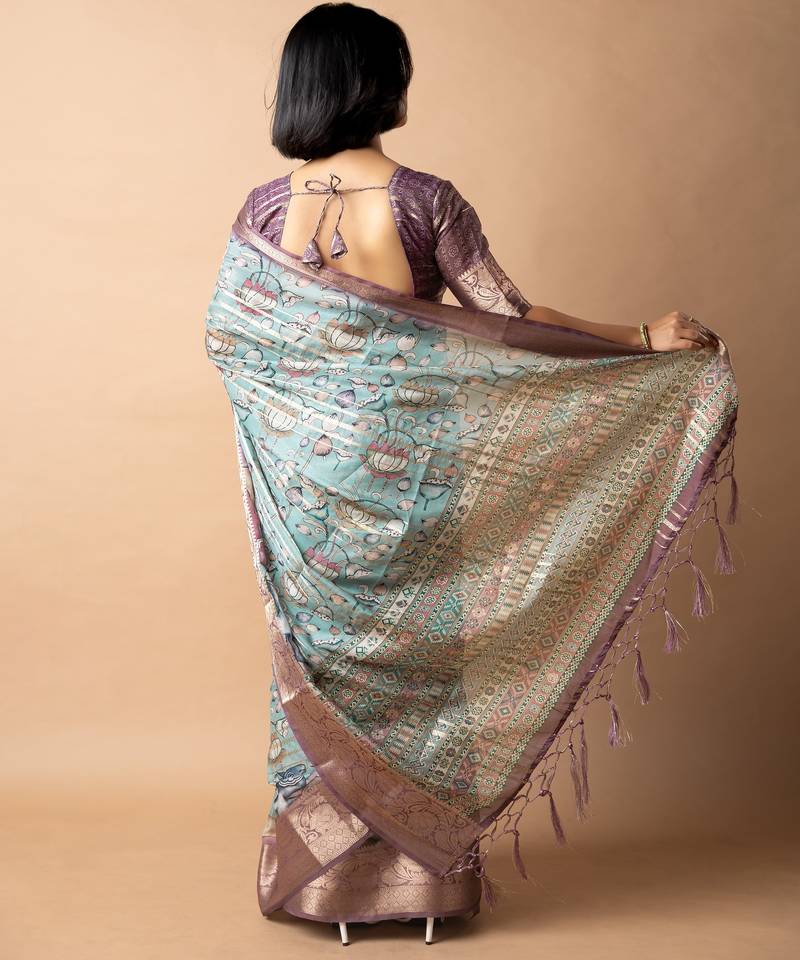 teal floral print zari woven border crepe saree with unstiched blouse piece