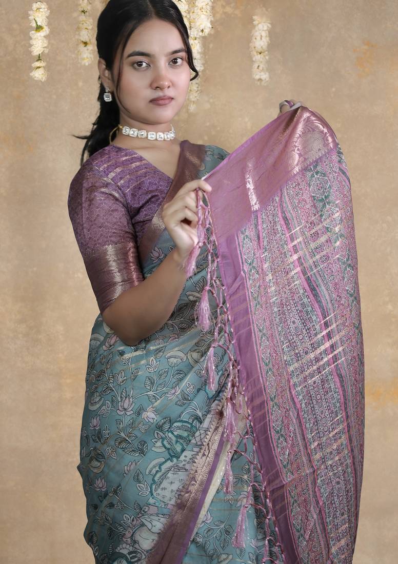 turquoise floral print zari woven border crepe saree with unstiched blouse piece