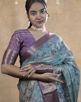 turquoise floral print zari woven border crepe saree with unstiched blouse piece 5