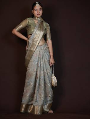 green floral print zari woven border crepe saree with unstiched blouse piece 1