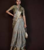 green floral print zari woven border crepe saree with unstiched blouse piece