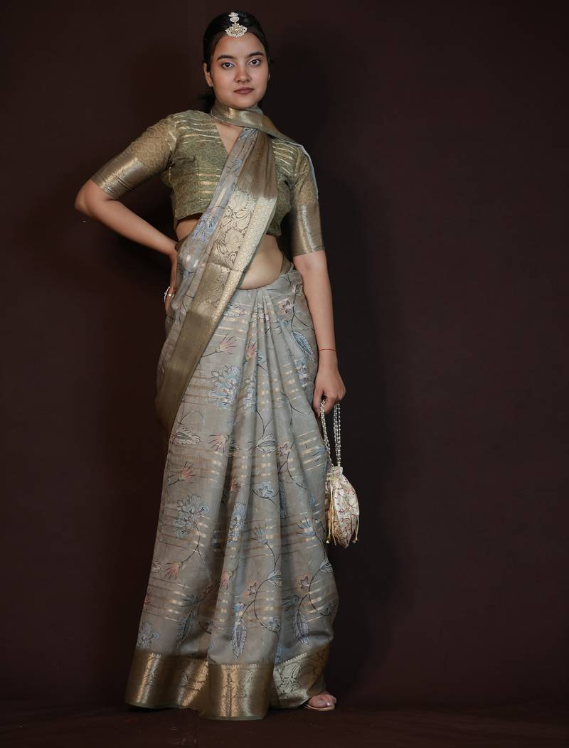 green floral print zari woven border crepe saree with unstiched blouse piece