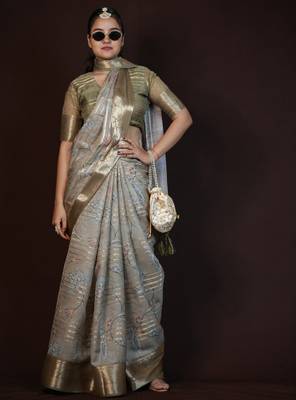 green floral print zari woven border crepe saree with unstiched blouse piece 2