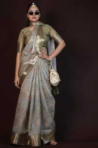 green floral print zari woven border crepe saree with unstiched blouse piece
