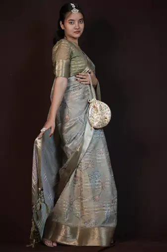 green floral print zari woven border crepe saree with unstiched blouse piece