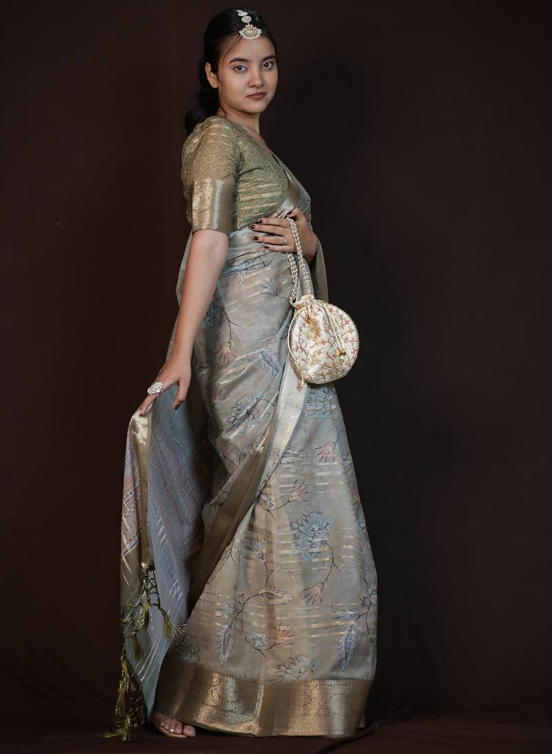 green floral print zari woven border crepe saree with unstiched blouse piece