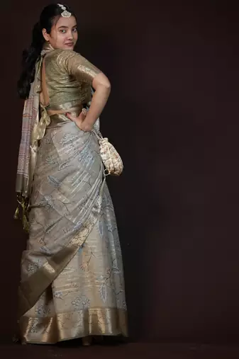 green floral print zari woven border crepe saree with unstiched blouse piece