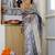 grey woven design golden zari border silk blend saree with unstiched blouse piece