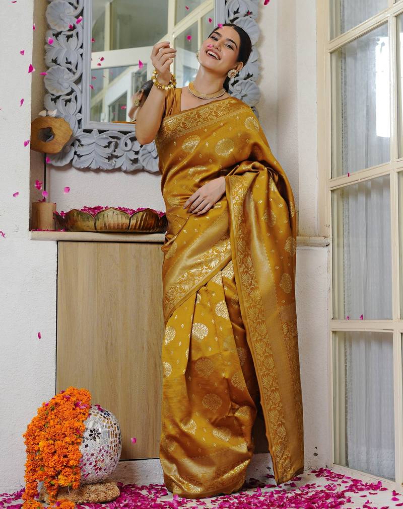mustard yellow woven design golden zari border silk blend saree with unstiched blouse piece