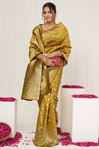 mustard yellow woven design golden zari border silk blend saree with unstiched blouse piece