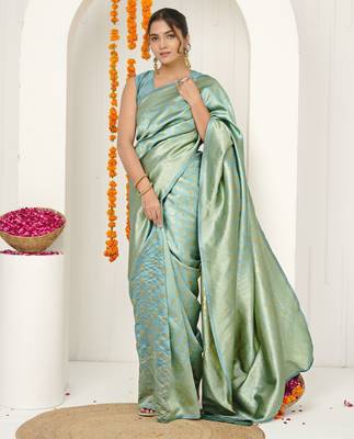 pista green woven design golden zari border silk blend saree with unstiched blouse piece 1