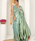 teal woven design golden zari border silk blend saree with unstiched blouse piece