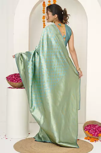 pista green woven design golden zari border silk blend saree with unstiched blouse piece