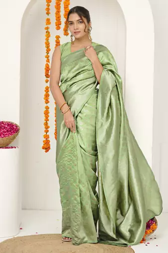 pista green woven design golden zari border silk blend saree with unstiched blouse piece