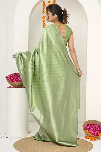 pista green woven design golden zari border silk blend saree with unstiched blouse piece