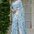 pastel blue floral print zari woven border silk blend saree with unstiched blouse piece