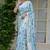 pastel blue floral print zari woven border silk blend saree with unstiched blouse piece
