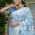 pastel blue floral print zari woven border silk blend saree with unstiched blouse piece