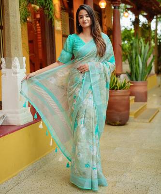 peach floral print zari woven border cotton blend saree with unstiched blouse piece 1