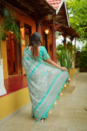 peach floral print zari woven border cotton blend saree with unstiched blouse piece