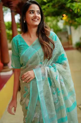 peach floral print zari woven border cotton blend saree with unstiched blouse piece
