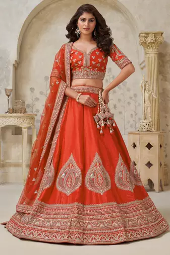 Trendy Rust Wedding Lehenga with Leaf Embroidery