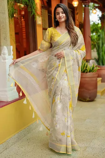 beige floral print zari woven border cotton blend saree with unstiched blouse piece