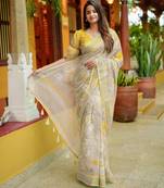 beige floral print zari woven border cotton blend saree with unstiched blouse piece