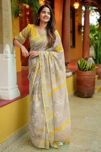 beige floral print zari woven border cotton blend saree with unstiched blouse piece