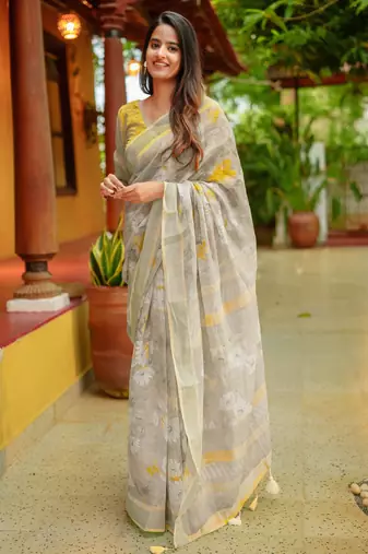 beige floral print zari woven border cotton blend saree with unstiched blouse piece