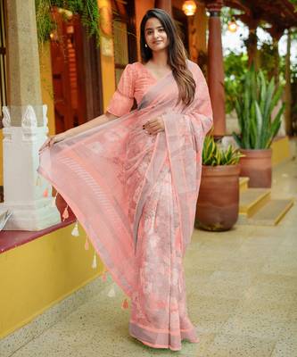 peach floral print zari woven border cotton blend saree with unstiched blouse piece 1