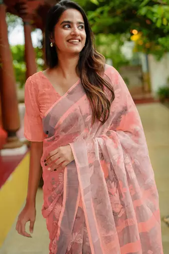 peach floral print zari woven border cotton blend saree with unstiched blouse piece