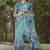 teal abstract print zari border cotton blend saree with unstiched blouse piece