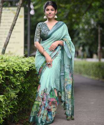 teal abstract print zari border cotton blend saree with unstiched blouse piece 1