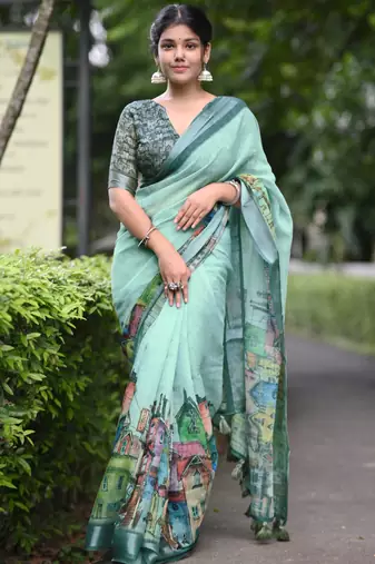 teal abstract print zari border cotton blend saree with unstiched blouse piece