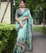 teal abstract print zari border cotton blend saree with unstiched blouse piece