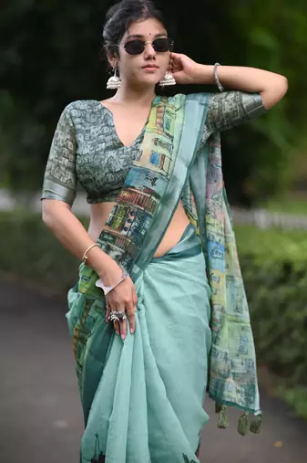 teal abstract print zari border cotton blend saree with unstiched blouse piece