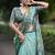 teal abstract print zari border cotton blend saree with unstiched blouse piece