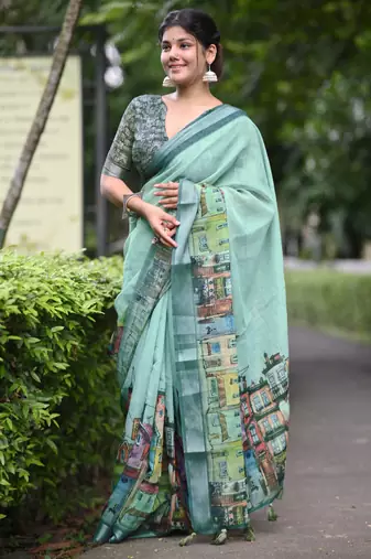 teal abstract print zari border cotton blend saree with unstiched blouse piece