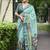 teal abstract print zari border cotton blend saree with unstiched blouse piece