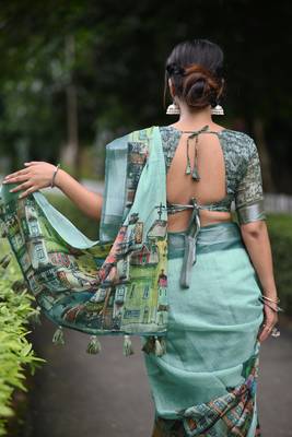 teal abstract print zari border cotton blend saree with unstiched blouse piece 4