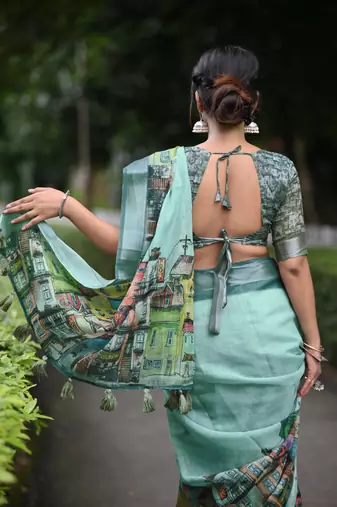 teal abstract print zari border cotton blend saree with unstiched blouse piece
