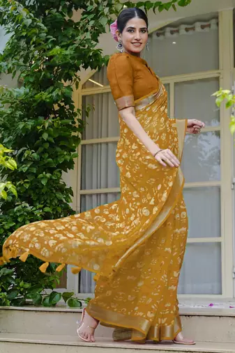 mustard floral block print zari border cotton blend saree with unstiched blouse piece