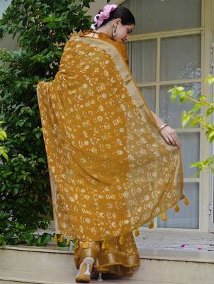 mustard floral block print zari border cotton blend saree with unstiched blouse piece 4