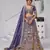 Divine Elegance in Purple     Bridal Lehenga with Temple & Cow Motifs