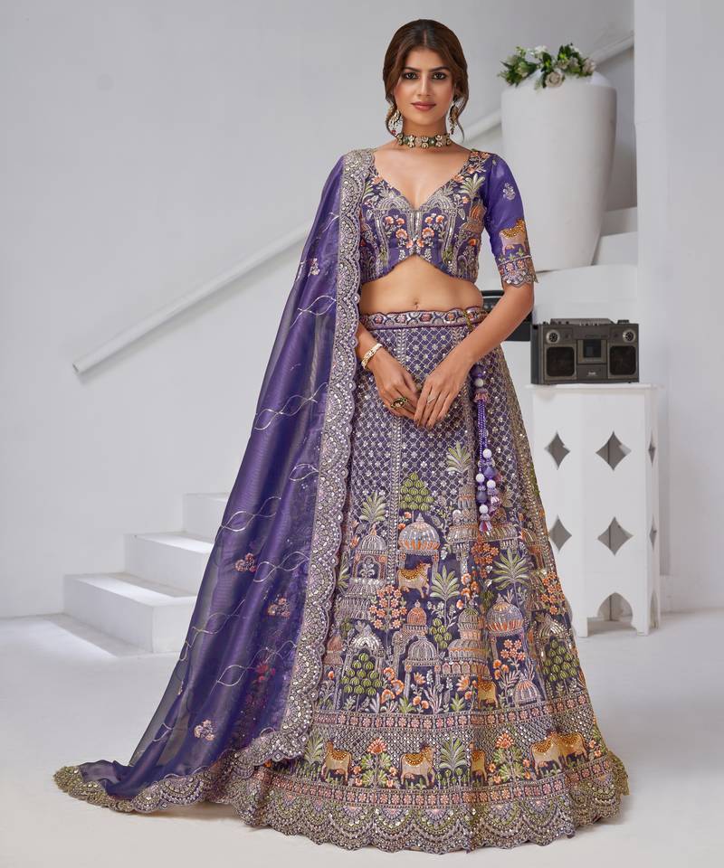 Divine Elegance in Purple – Bridal Lehenga with Temple & Cow Motifs